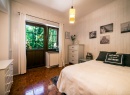 Sypialnia w apartamencie z wyjsciem na taras
